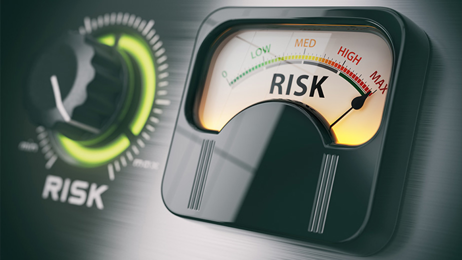 An image of a dial and a meter showing high risk