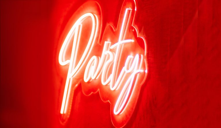 a neon sign that reads Party